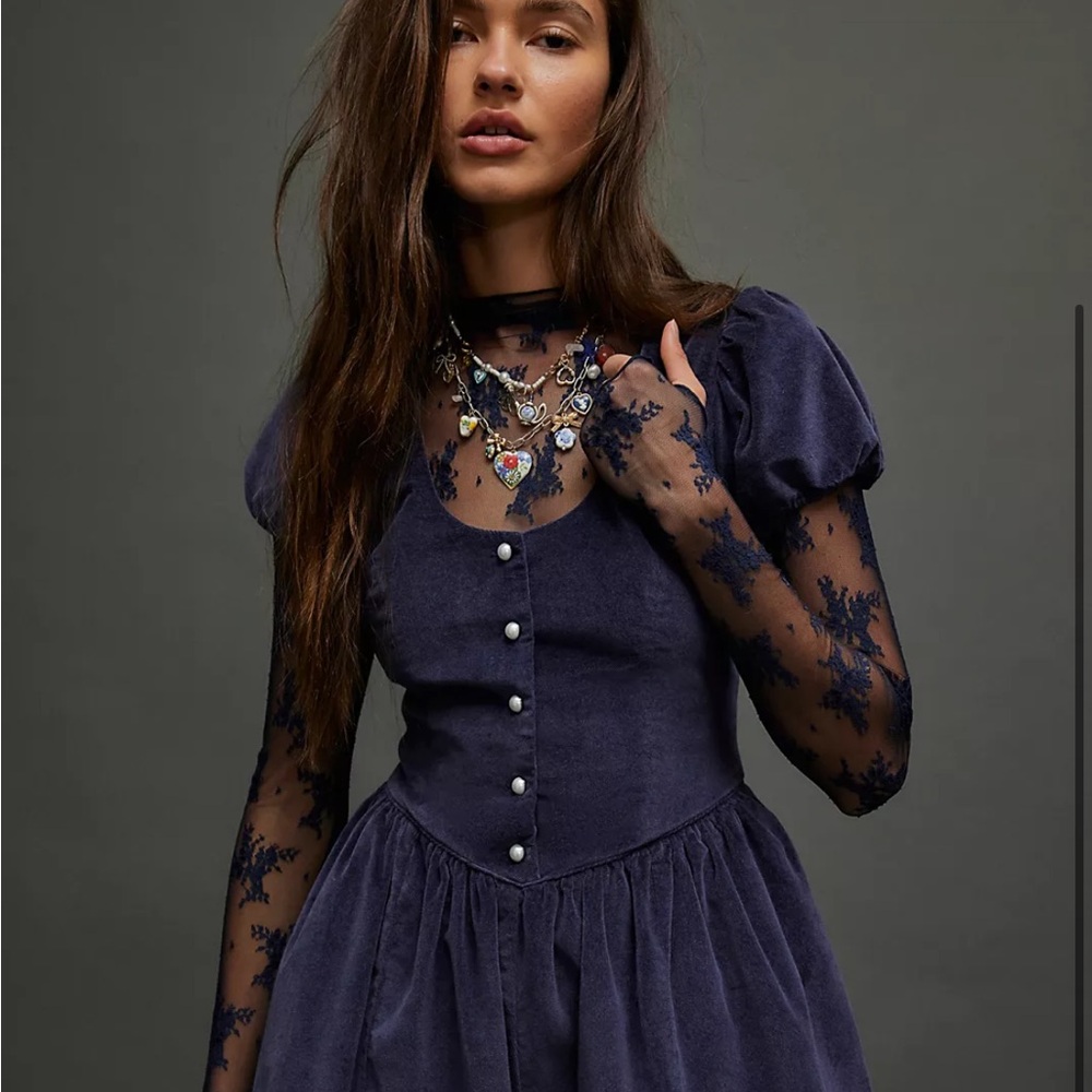 Free people navy puff sleeve romper with pearl details down the middle
